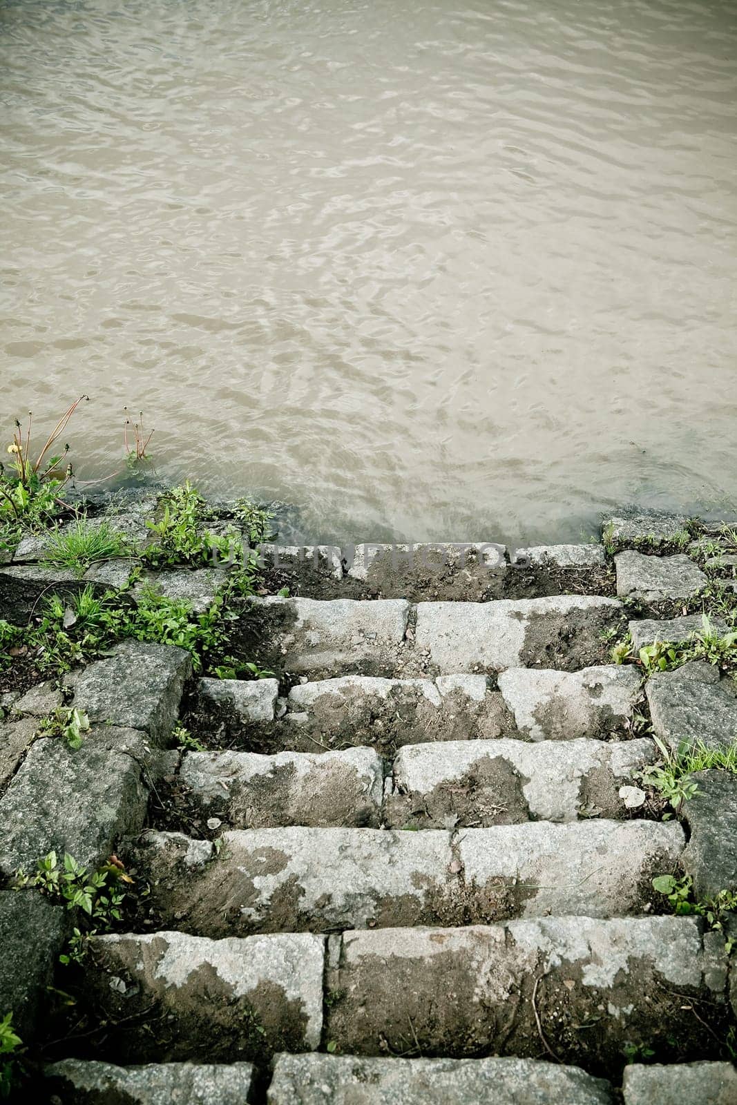Stairs to dirty water