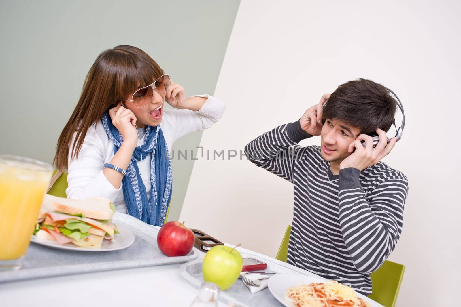 Student cafeteria - teenage couple