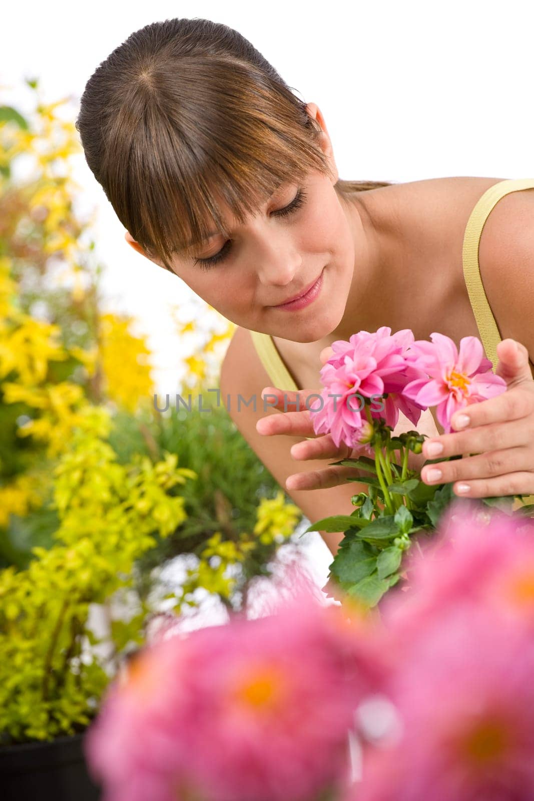 Gardening - portrait of woman with flower