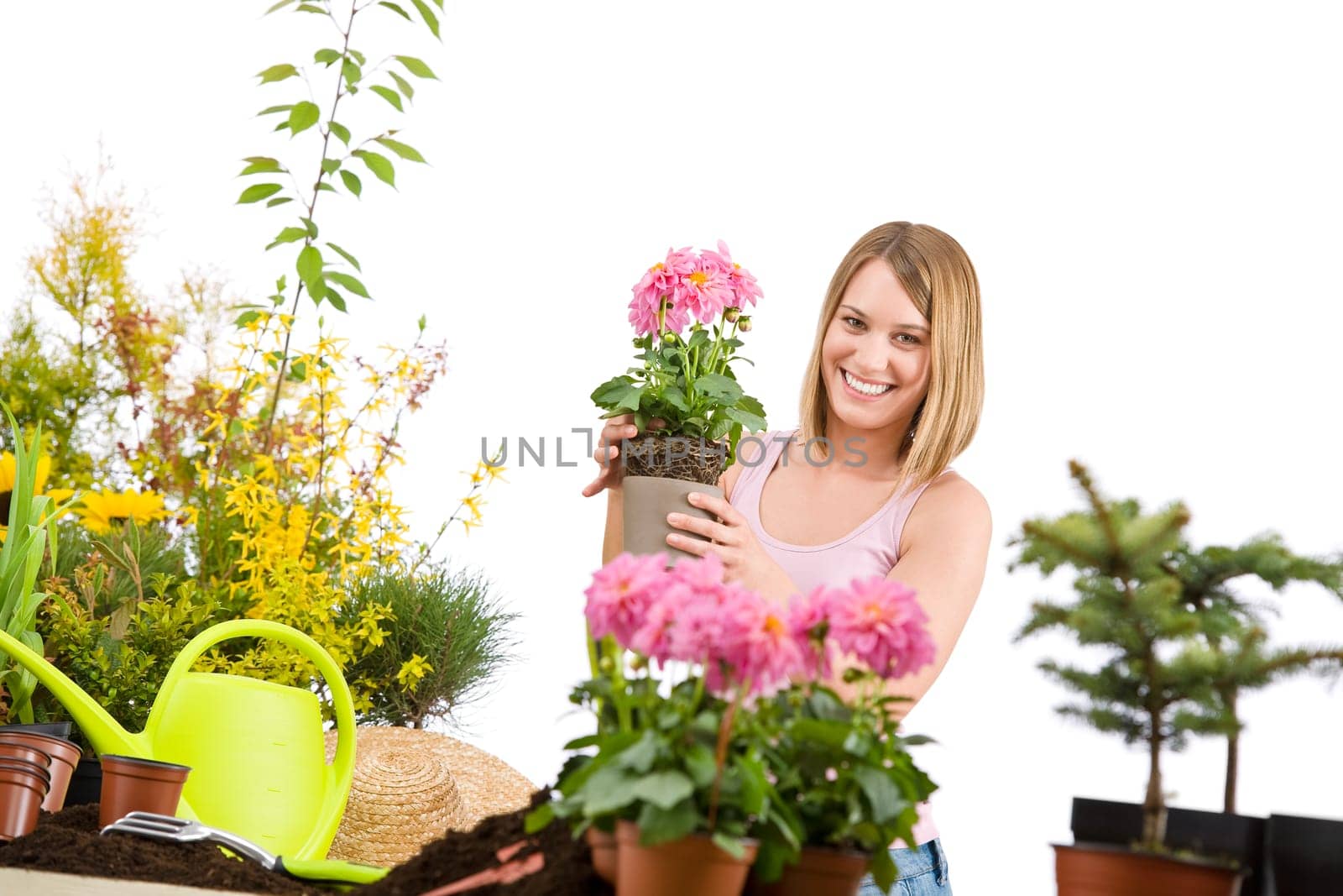 Gardening -  woman holding flower pot with flower
