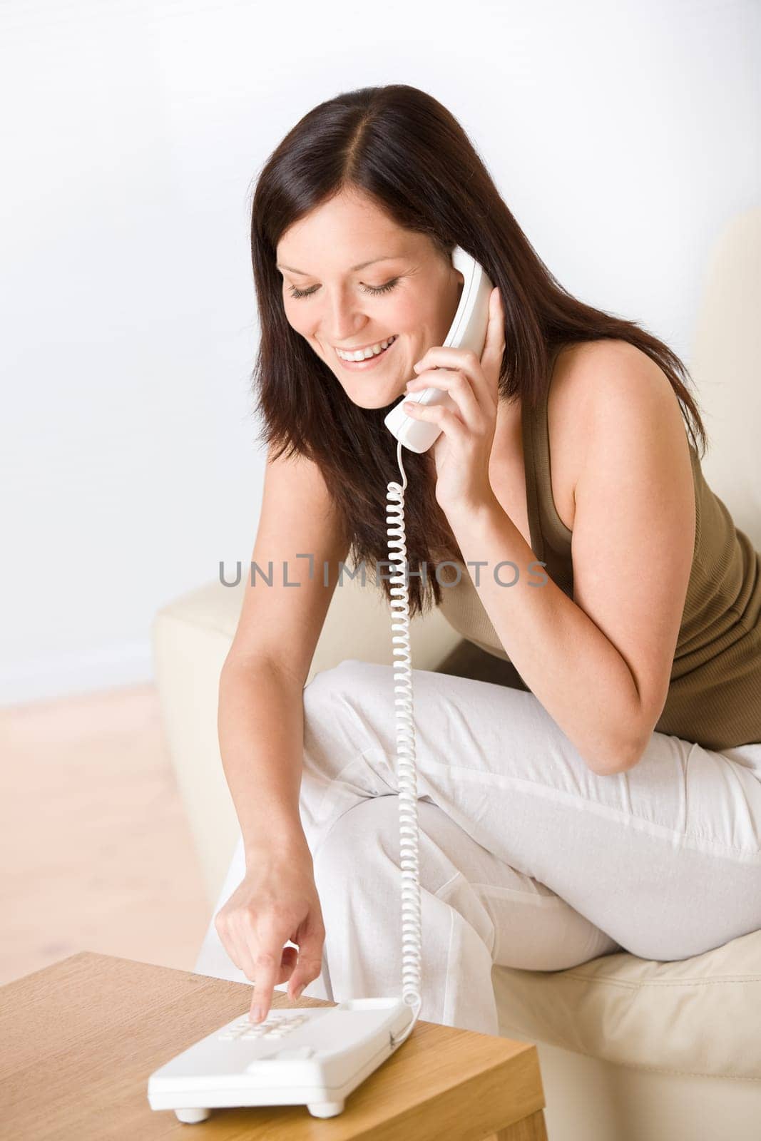 On the phone  woman dialing number calling