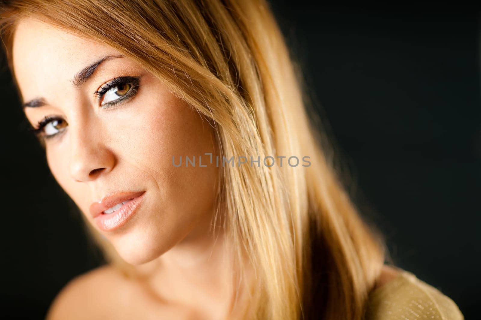 woman looking at camera and smiling