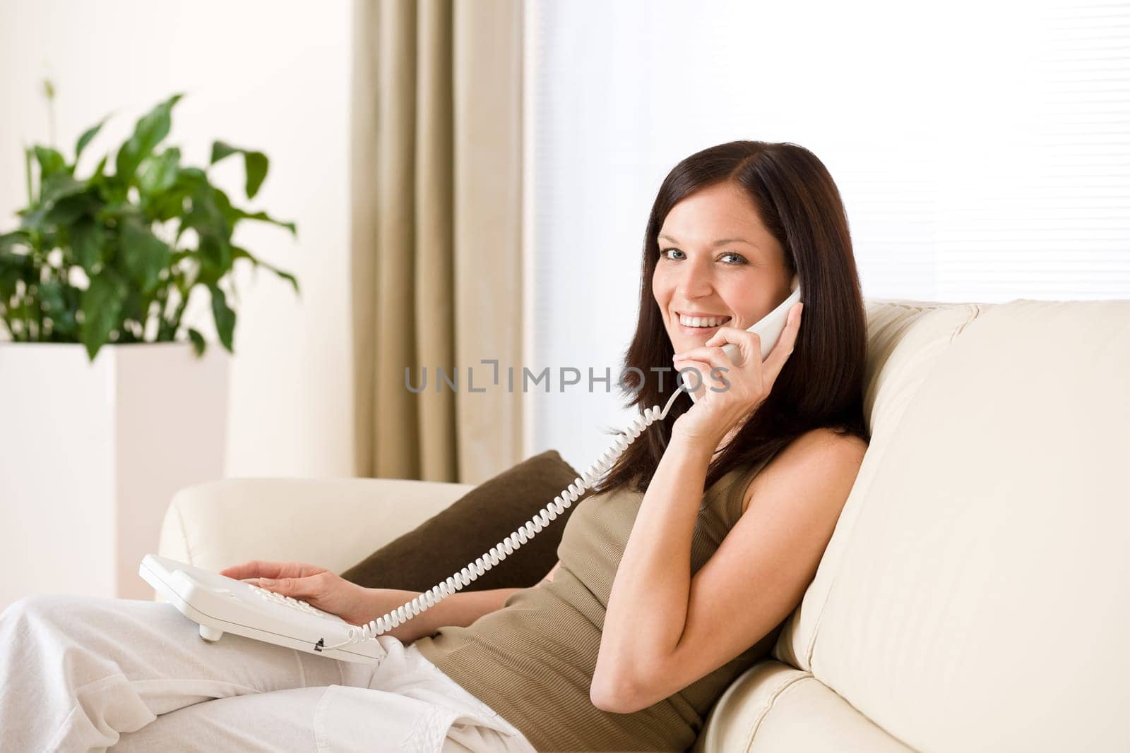 On the phone home woman calling