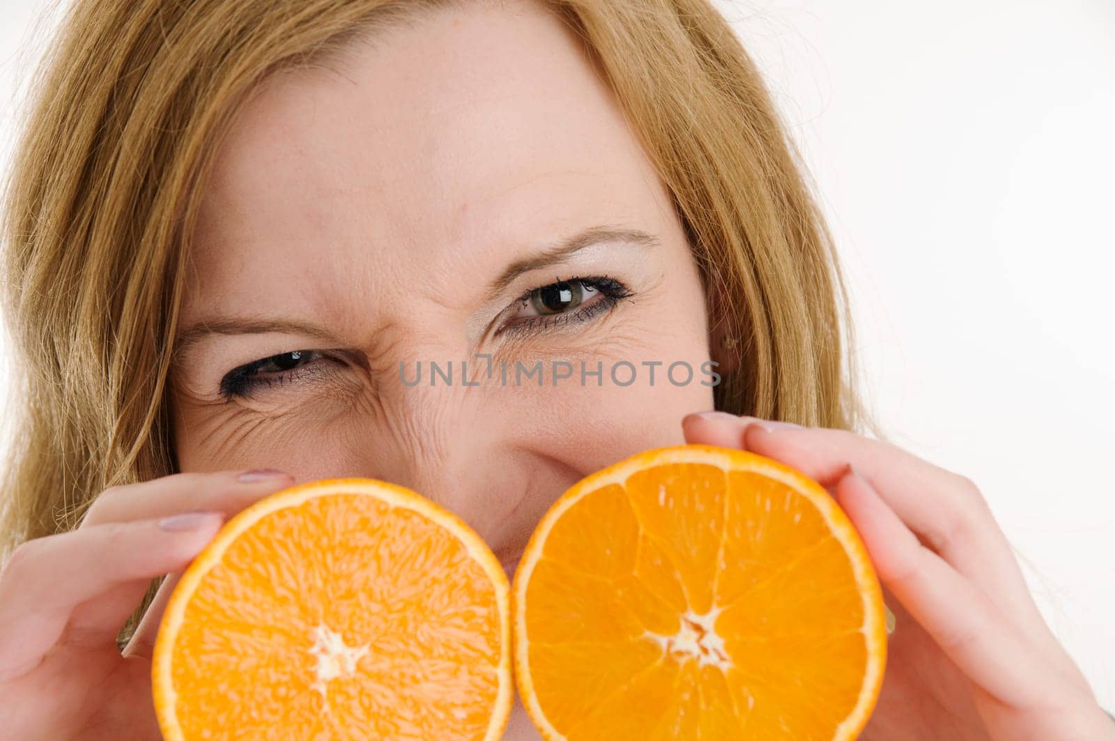 woman with delicious oranges