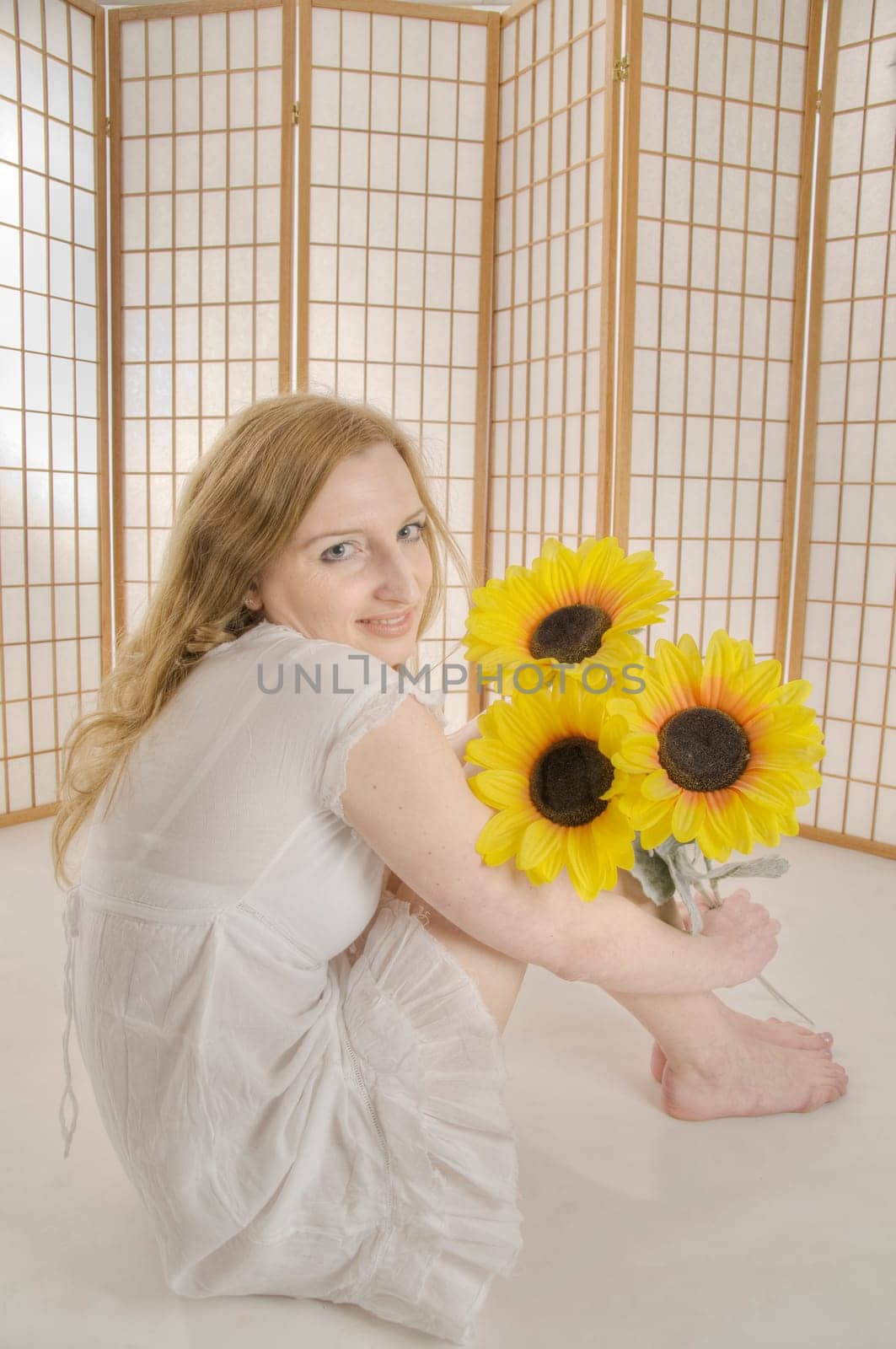valeria with three flowers
