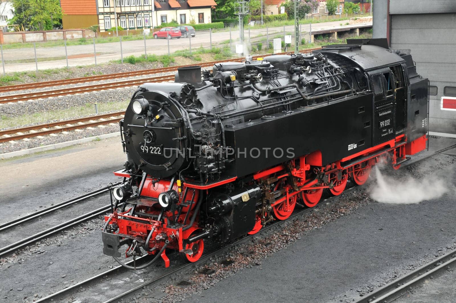 well-kept older steam locomotive waiting for the next use