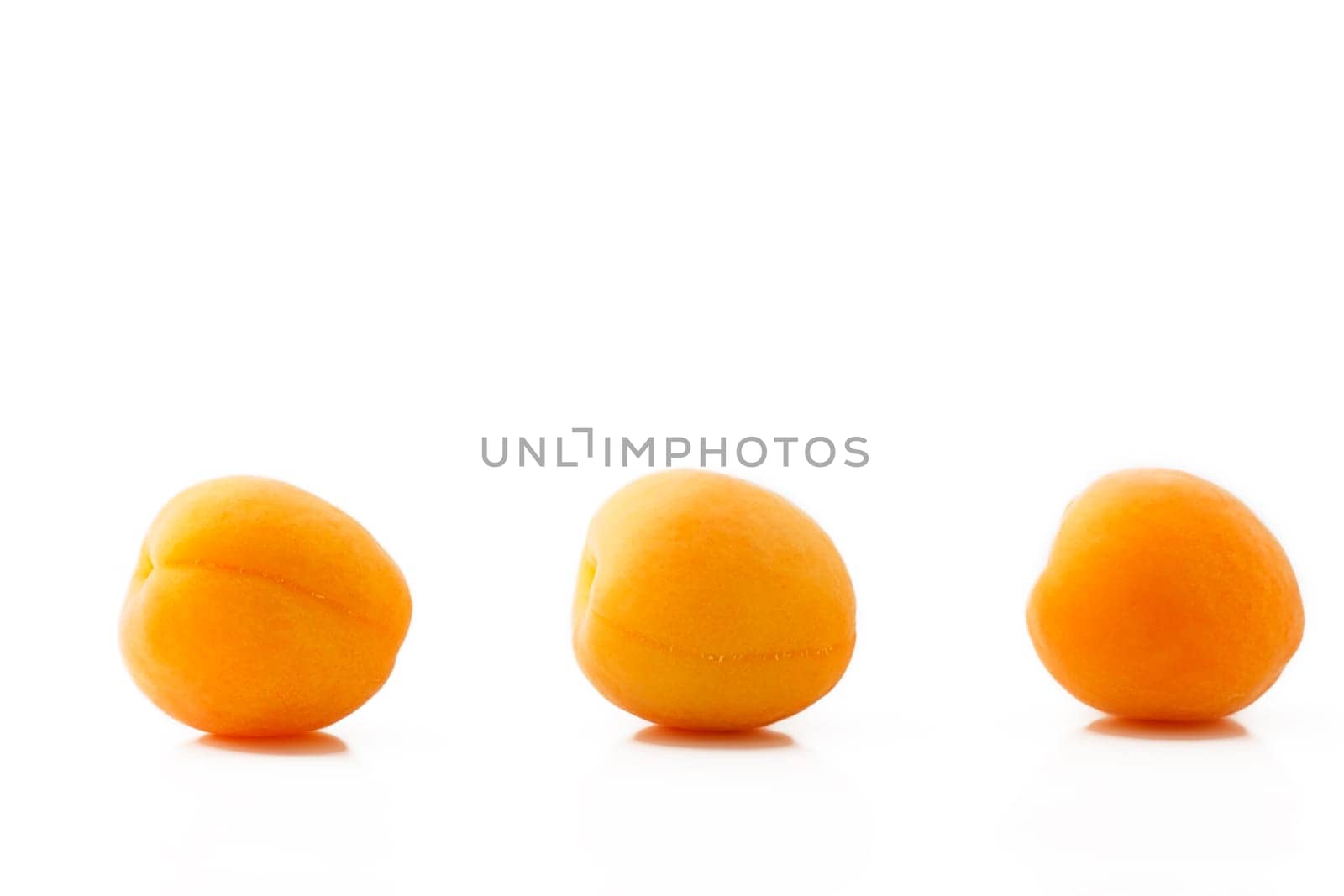 Three apricots in a row