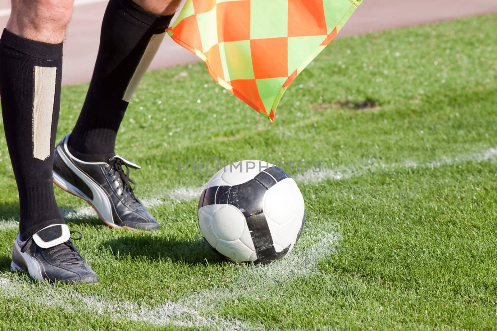 Referee in corner with ball