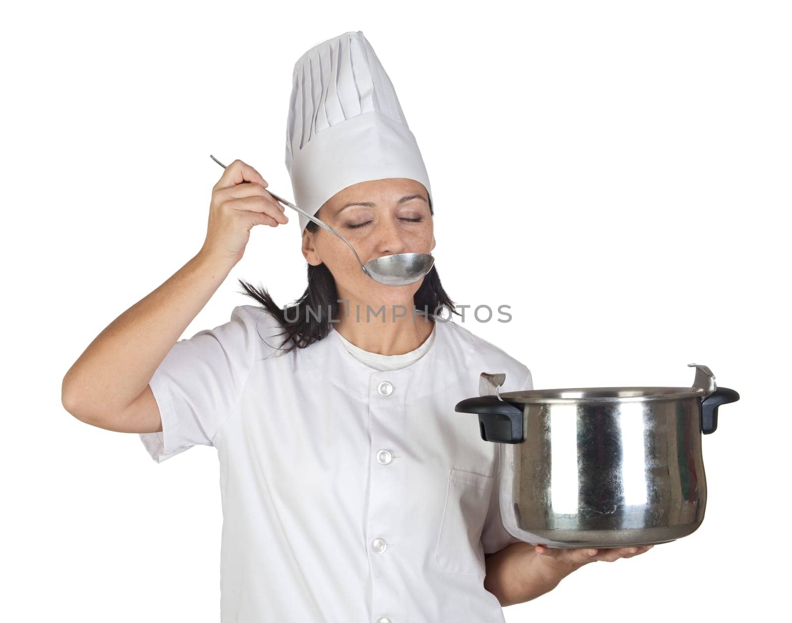 Pretty cook girl testing a meal