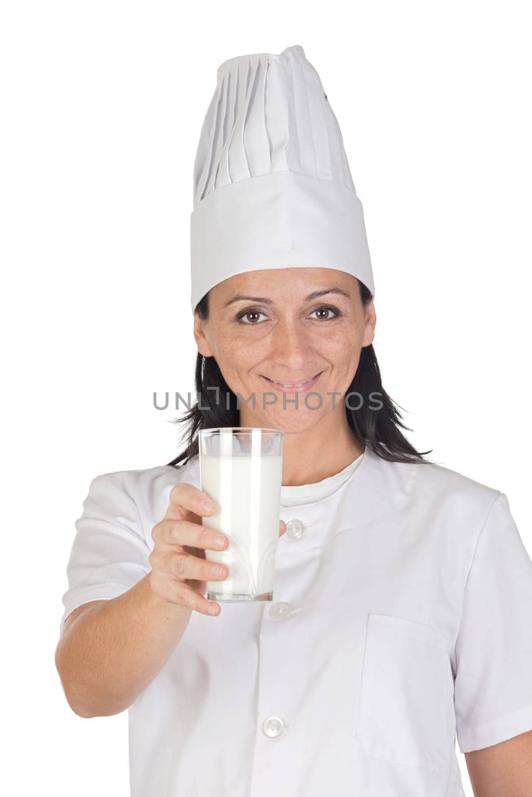 Pretty cook girl drinking milk