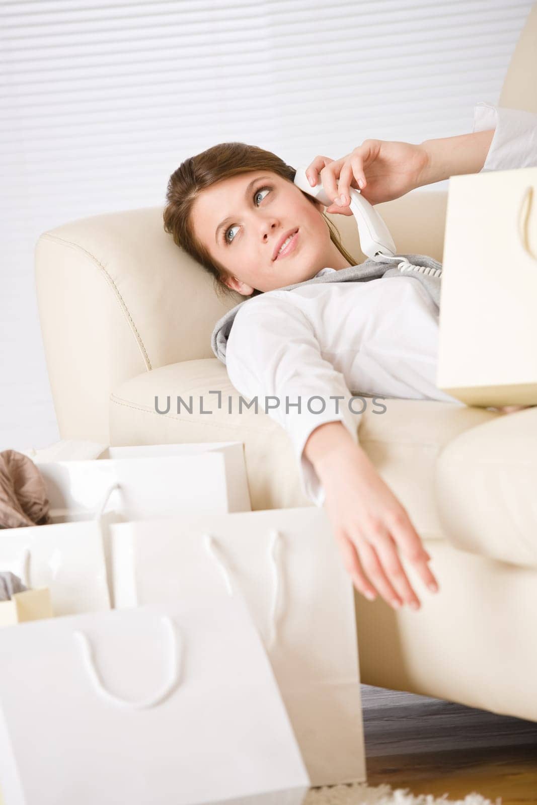 Young business woman with shopping bag