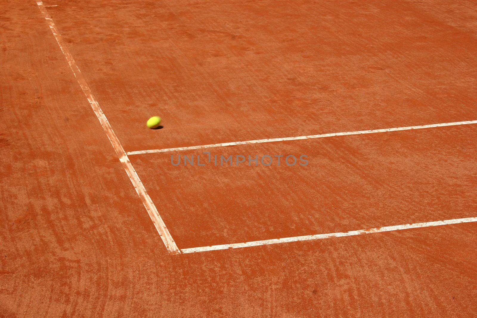 Tennis court with blurred ball