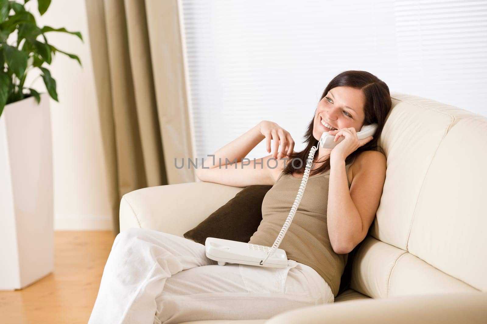 On the phone home - woman calling