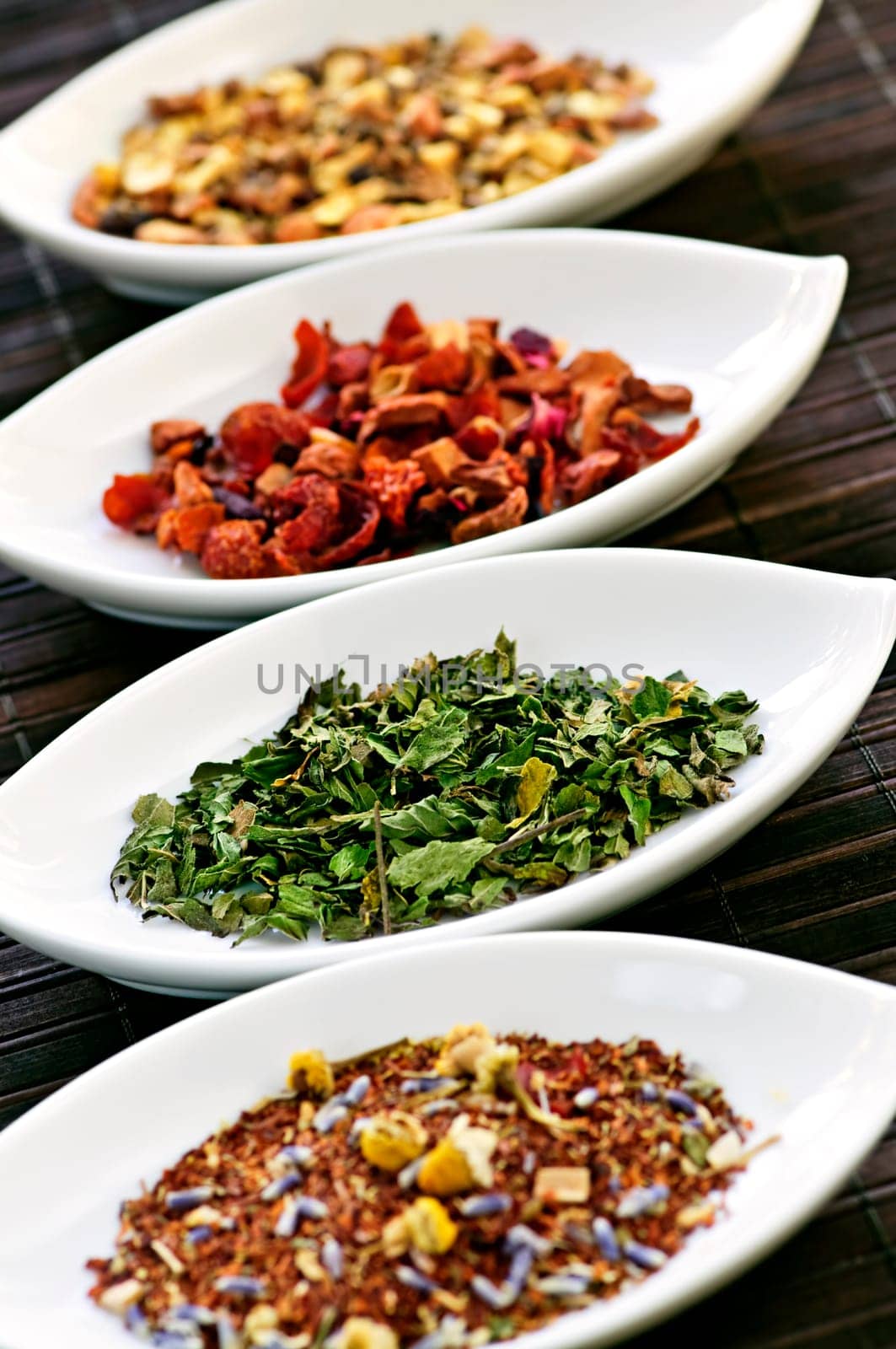 Assorted herbal wellness dry tea in bowls