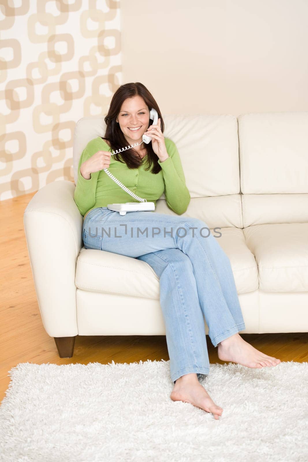On the phone home - young woman calling
