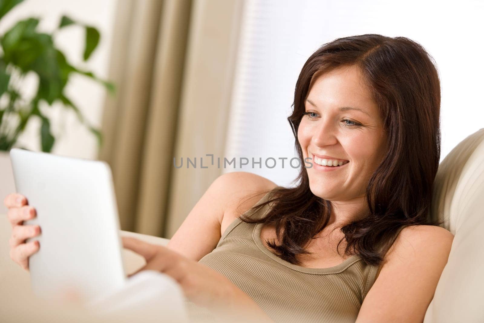 Woman with touch screen tablet computer