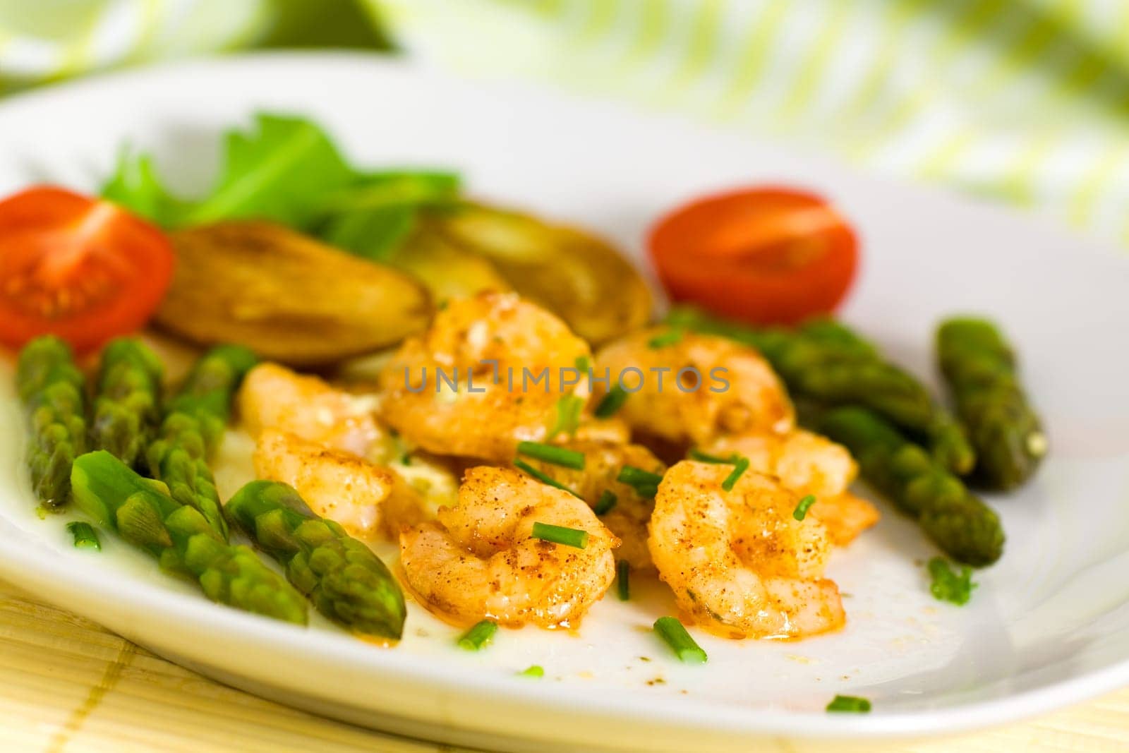Prawns with baked potatoes,and green