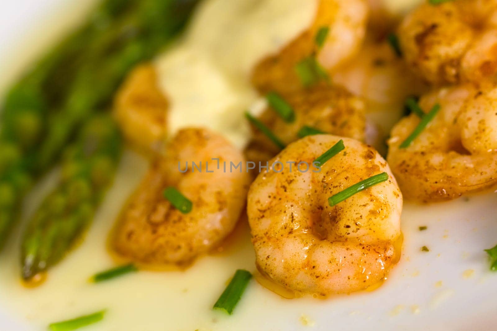 Prawns with baked potatoes,and green