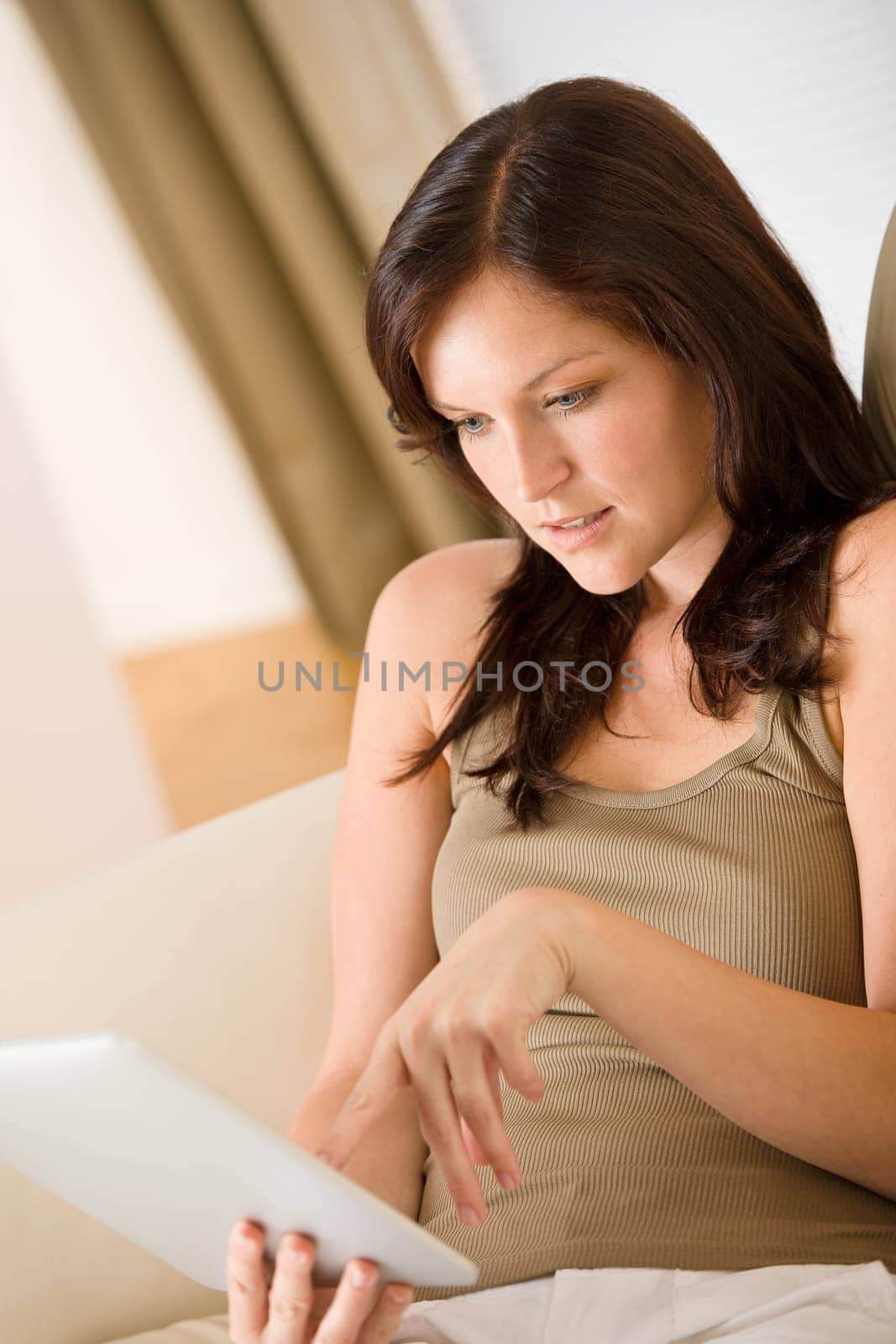 Young woman with touch screen tablet computer