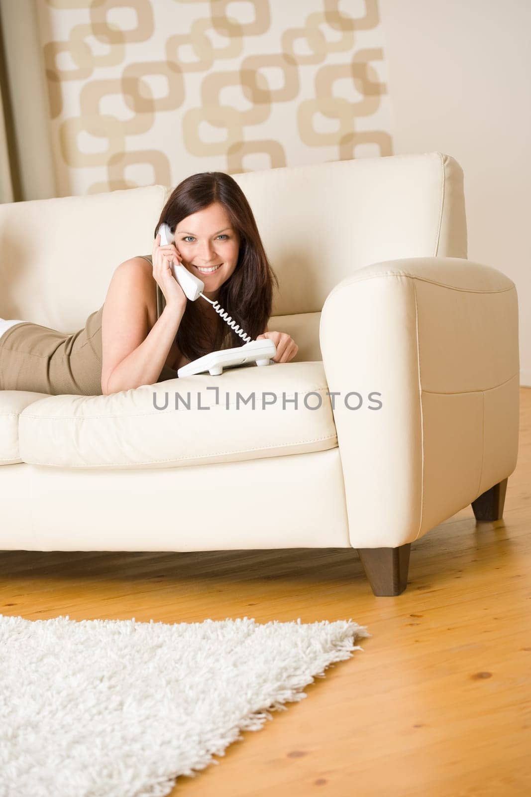 On the phone home - young woman calling