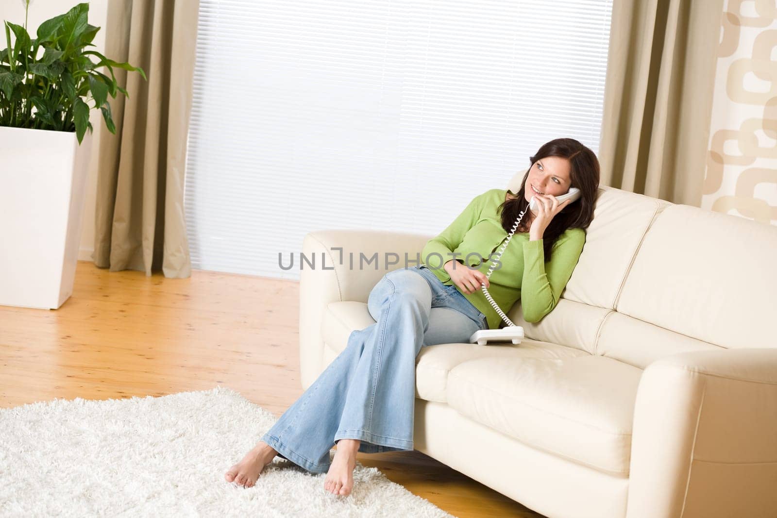 On the phone home - young woman calling