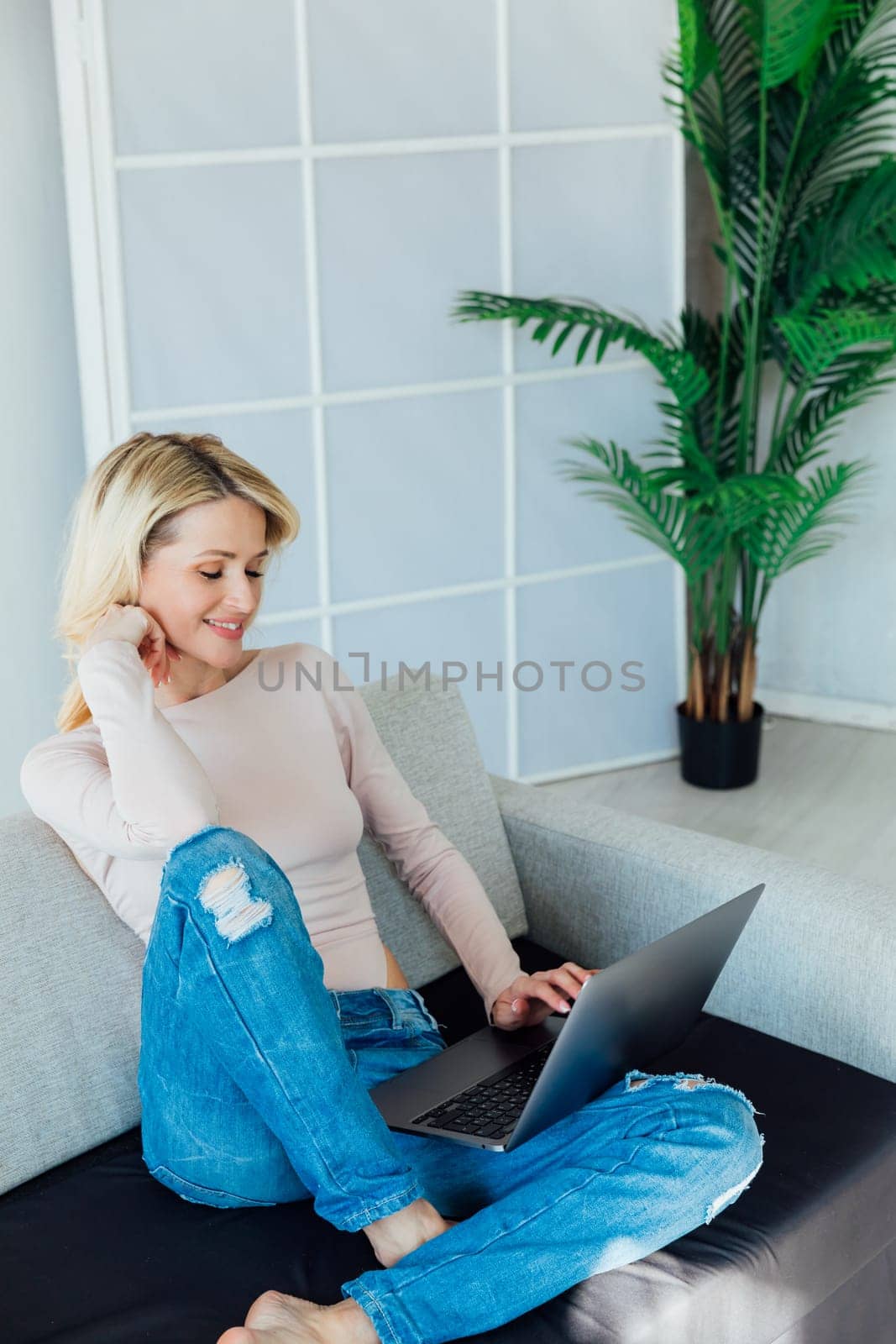 communication remote work woman with laptop computer internet conversation online communication in the room by Simakov