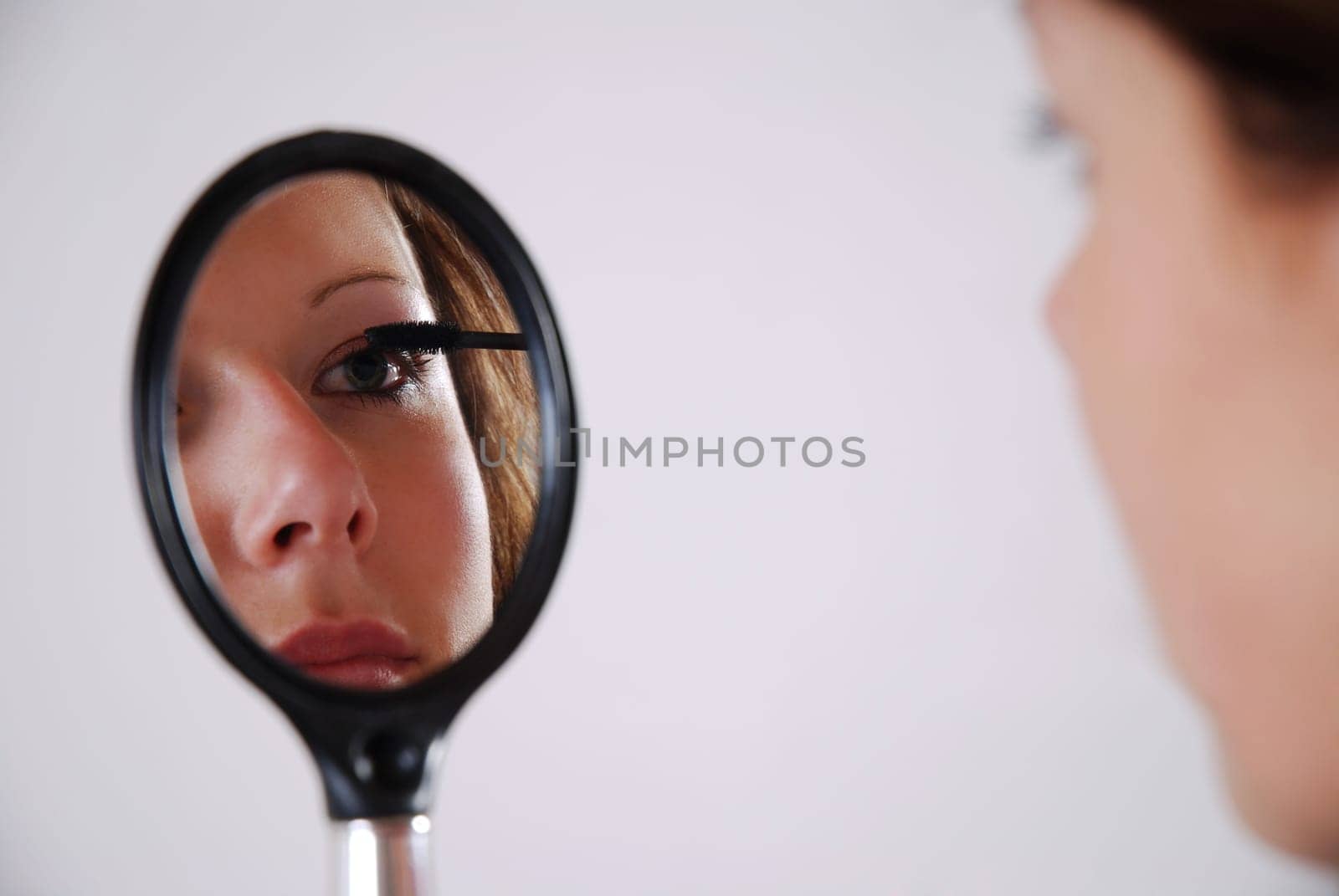 Apply mascara