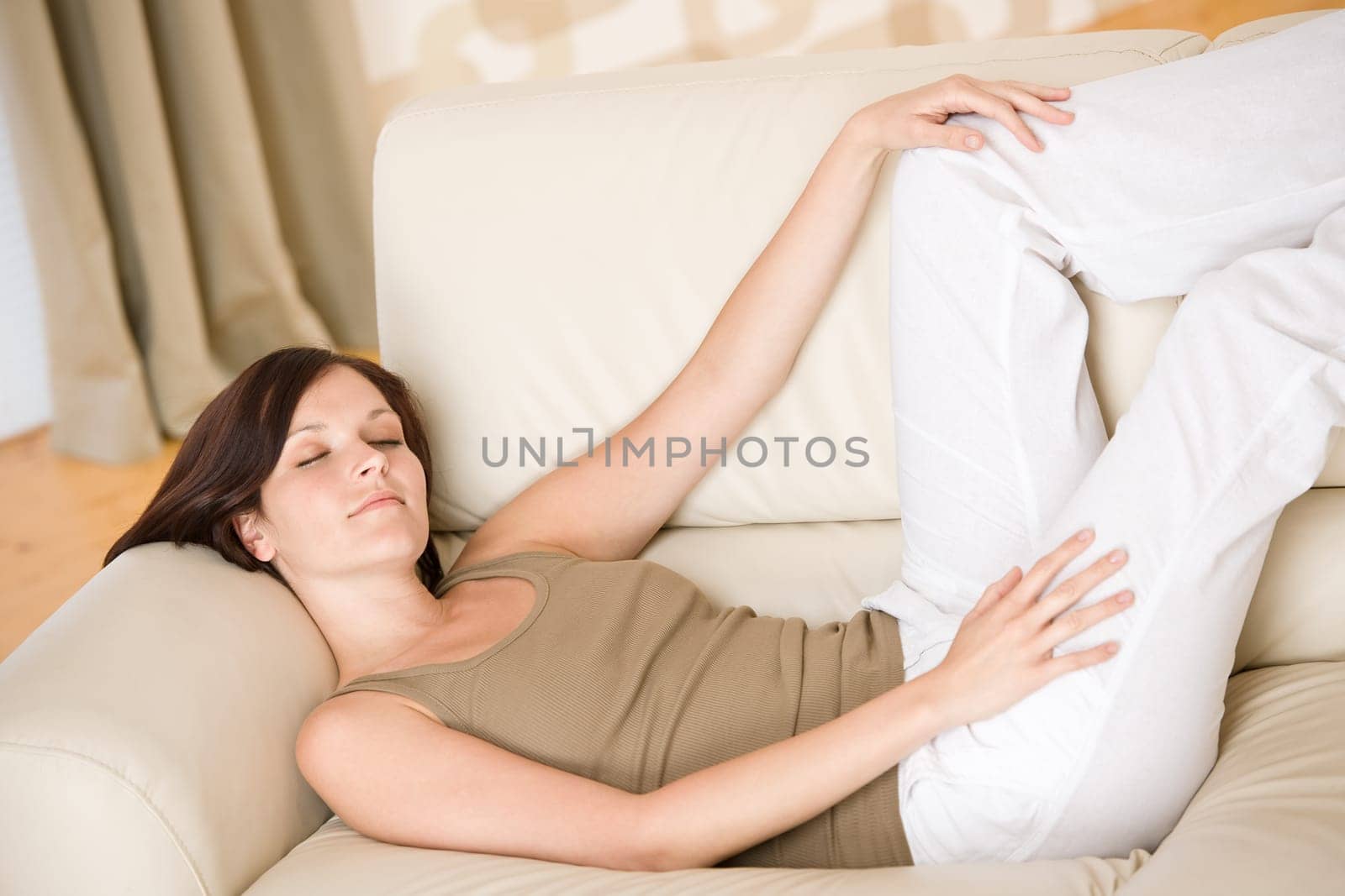 Young woman relax on sofa