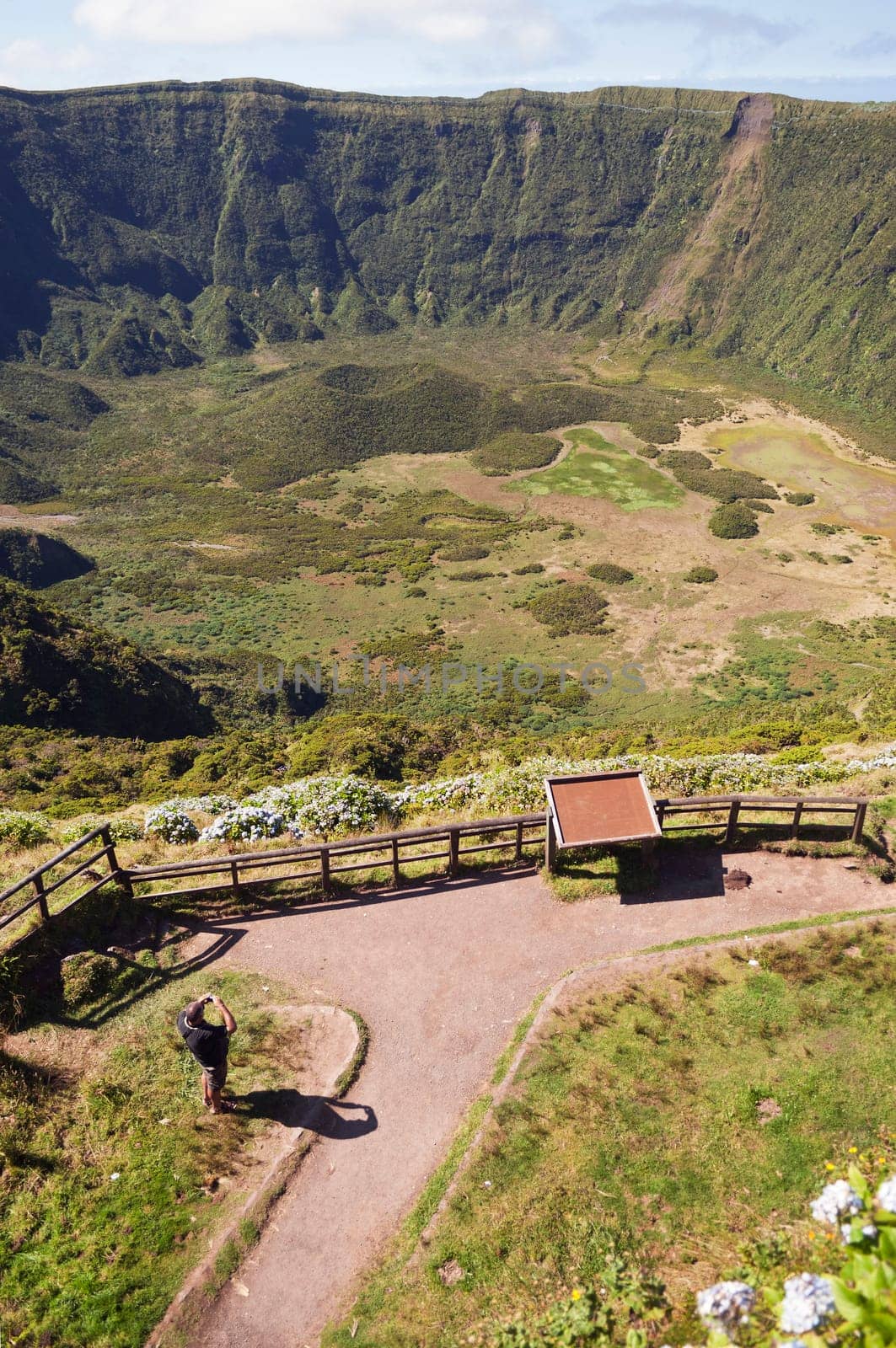 Tourists admiring Caldeira volcano in Faial, Azores