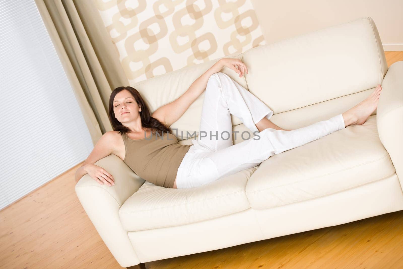 Young woman relax on sofa