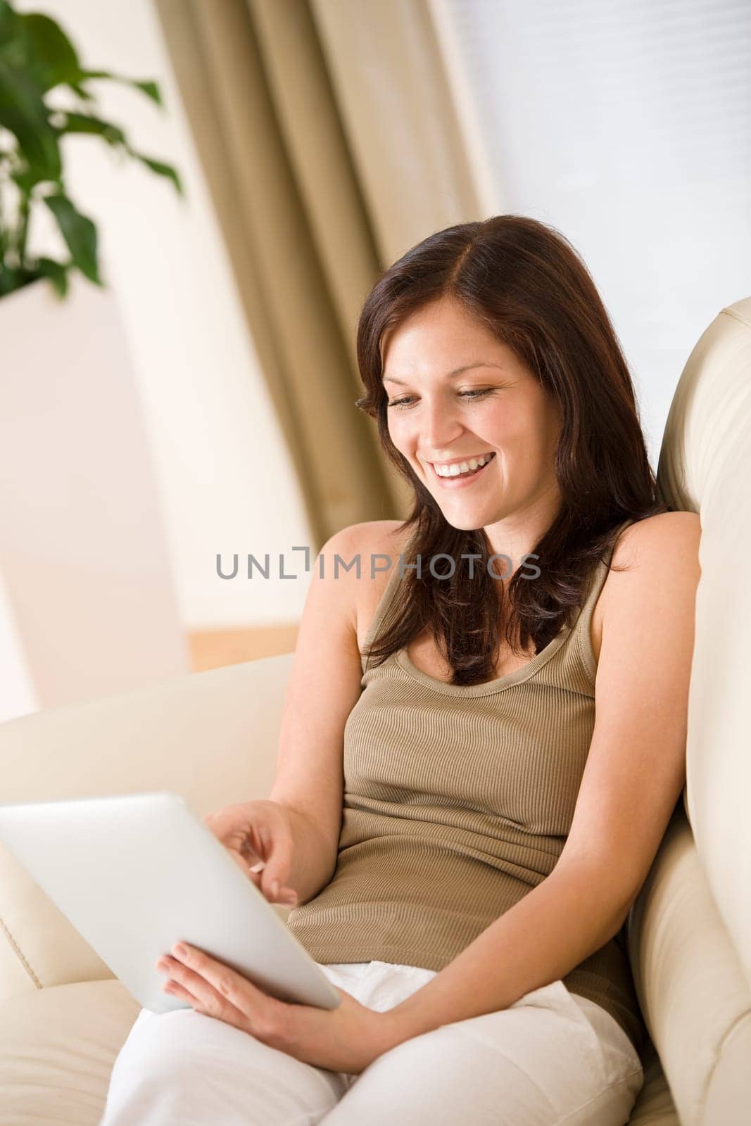 Woman with touch screen tablet computer