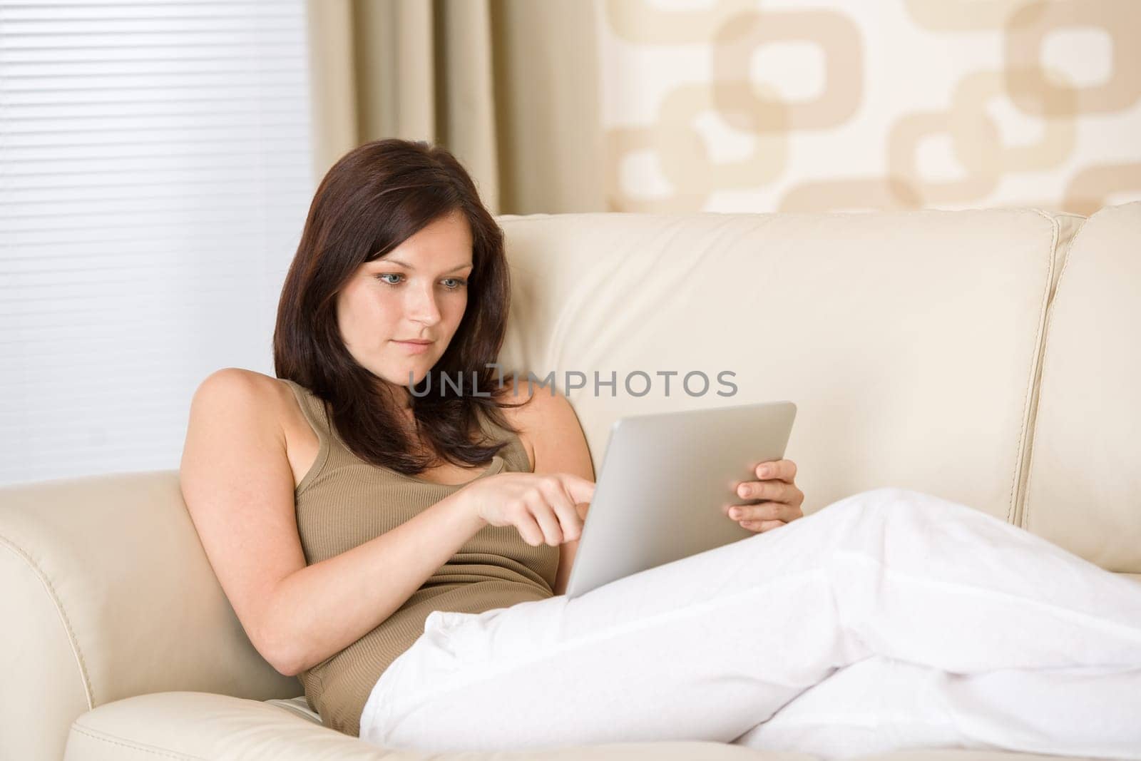 Woman with touch screen tablet computer