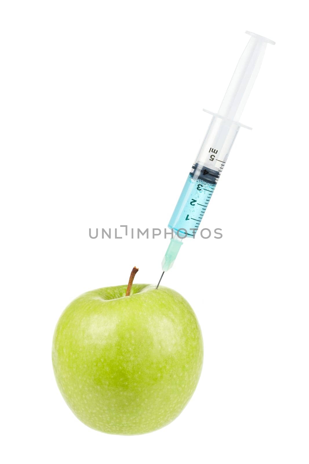 Green apple with syringe inserted