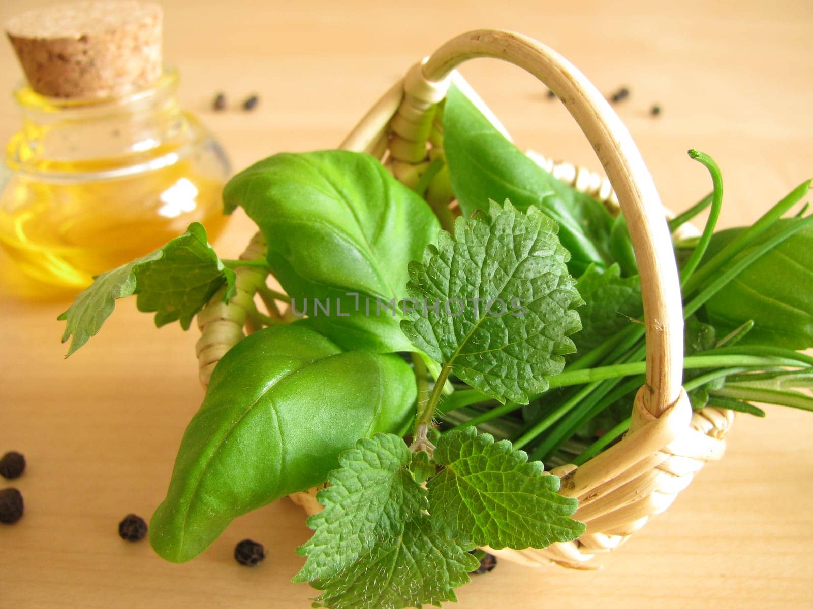 Herb basket and olive oil