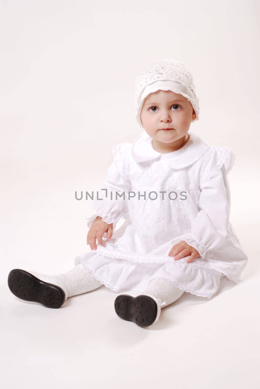 Girl in christening gown