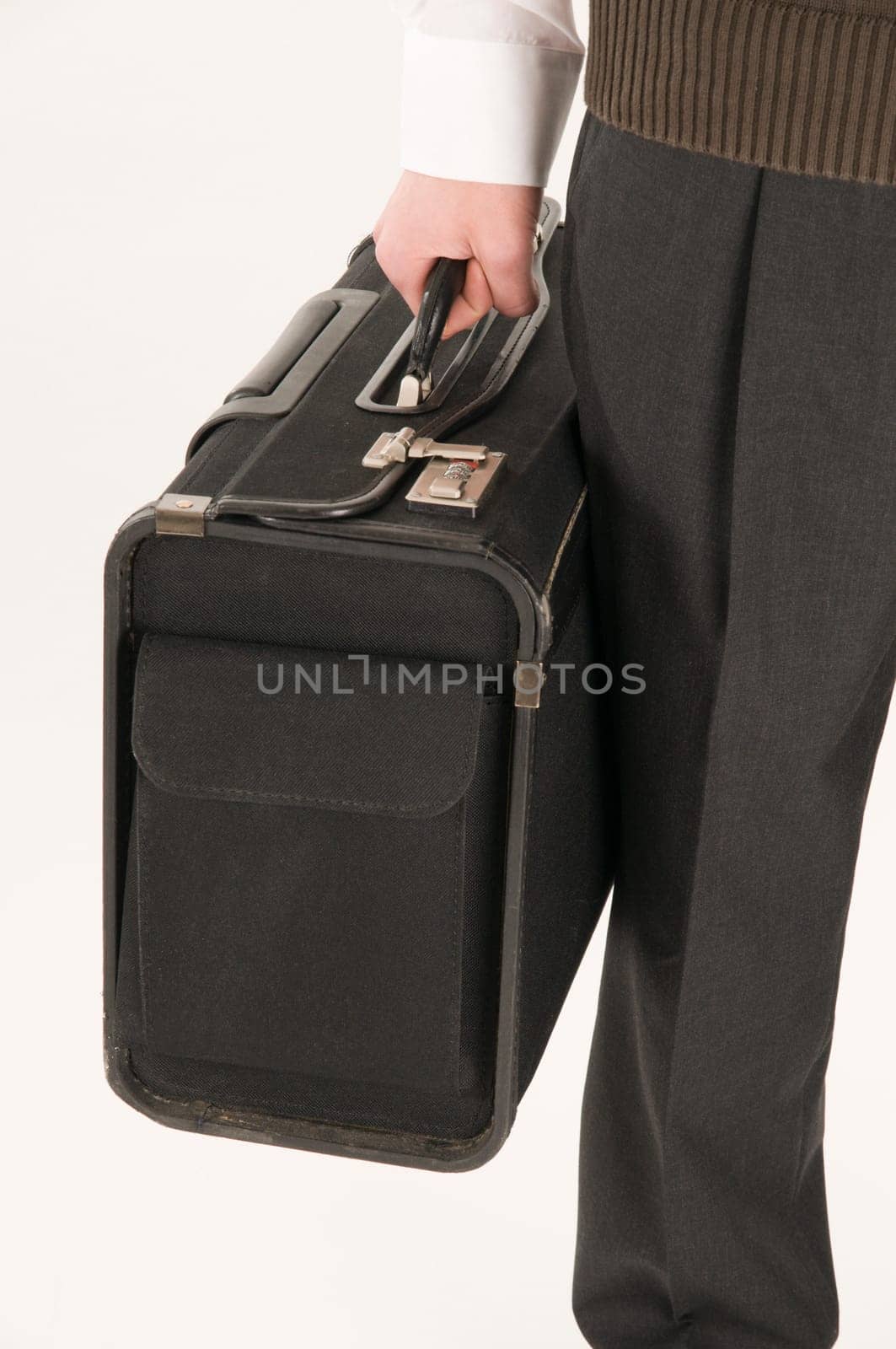suitcase in firm grip