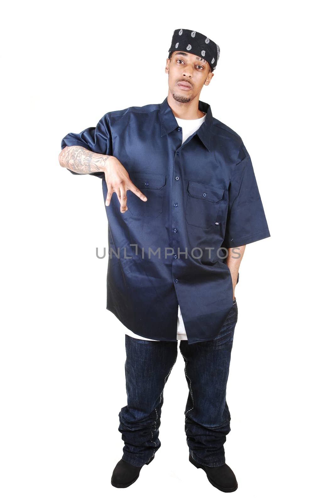 African American man standing.