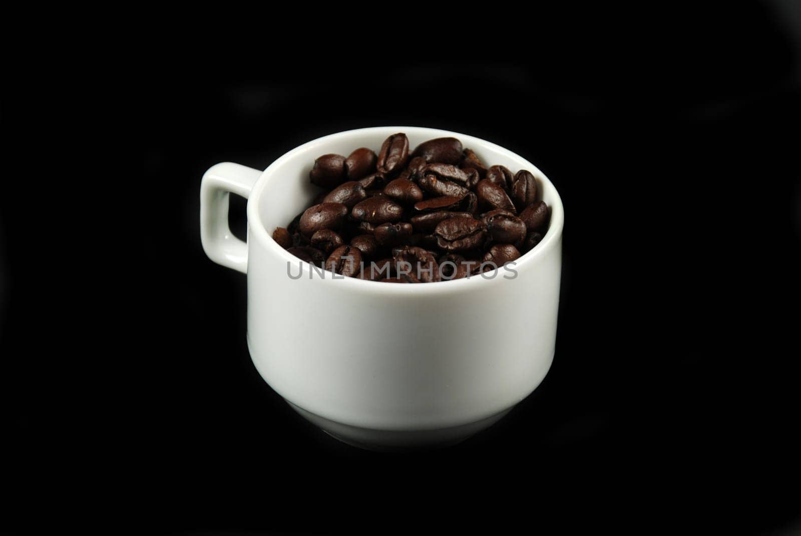Coffee beans and cup