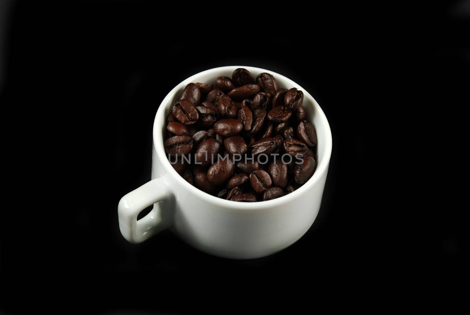 Coffee beans and cup