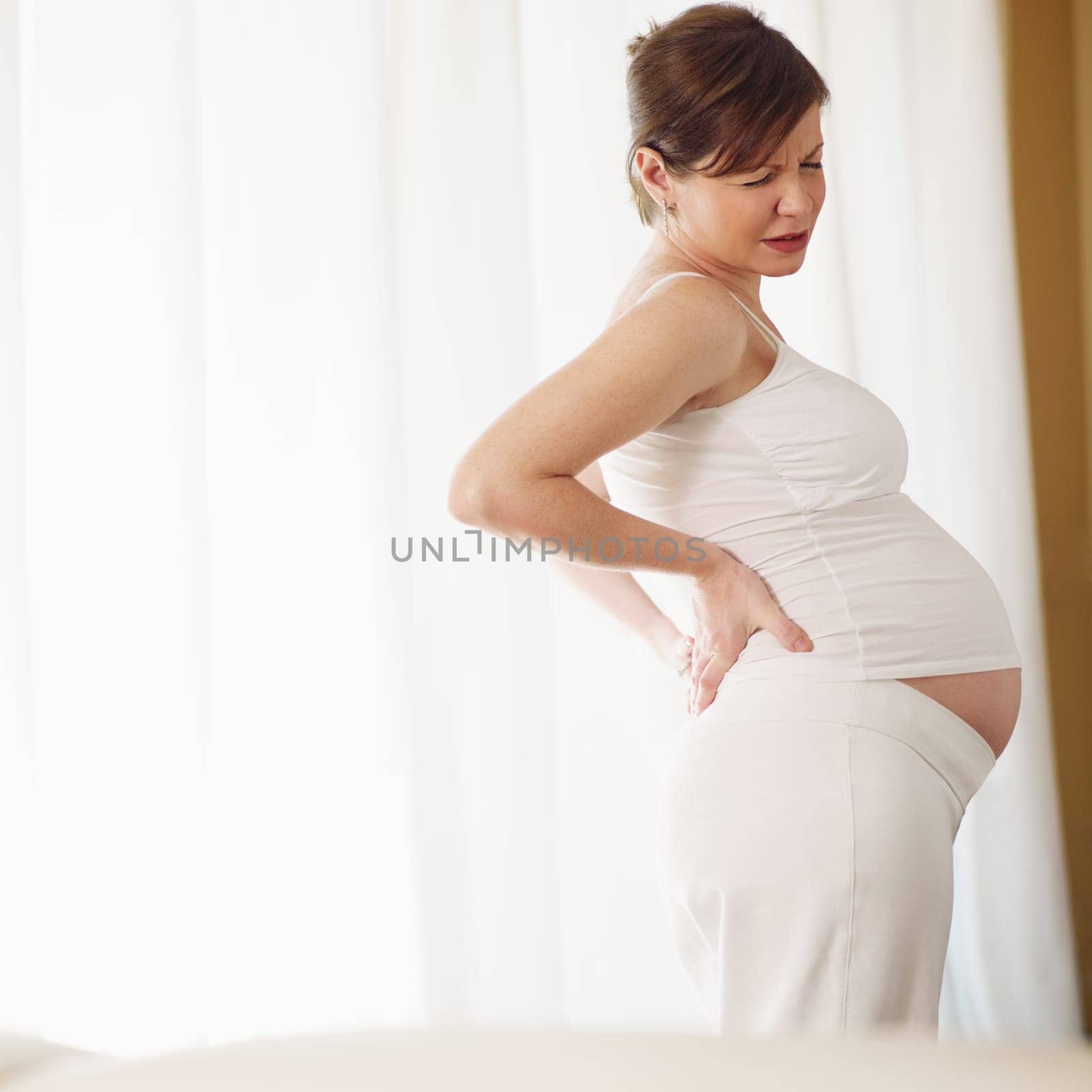 pregnant woman drinking water