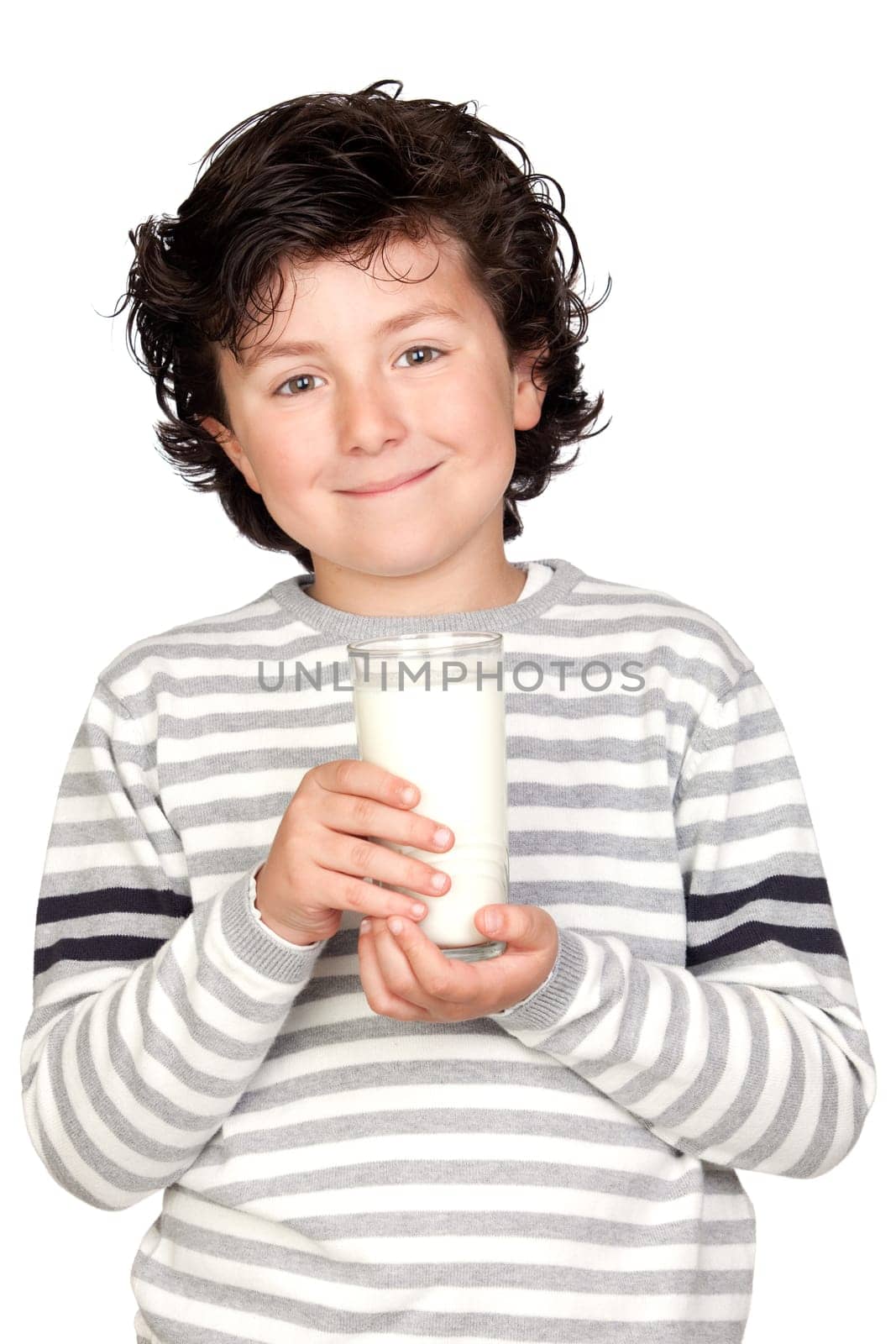 Beautiful child with glass of milk