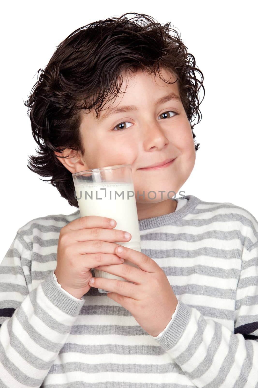 Beautiful child with glass of milk