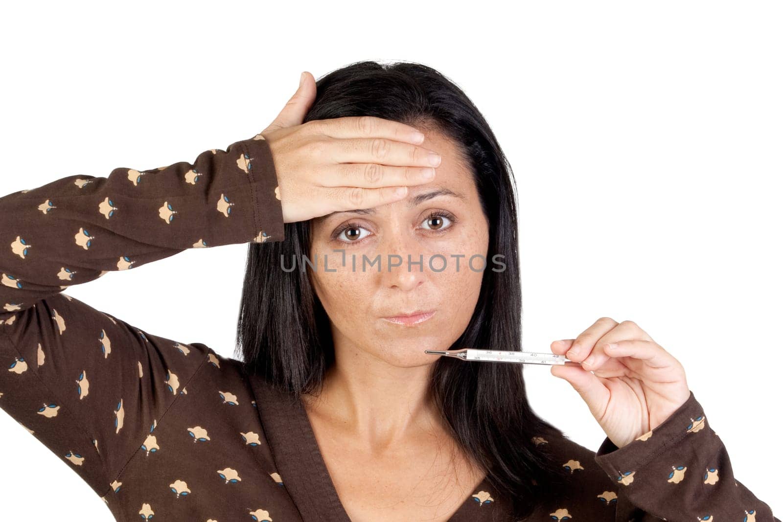 Sick girl with thermometer