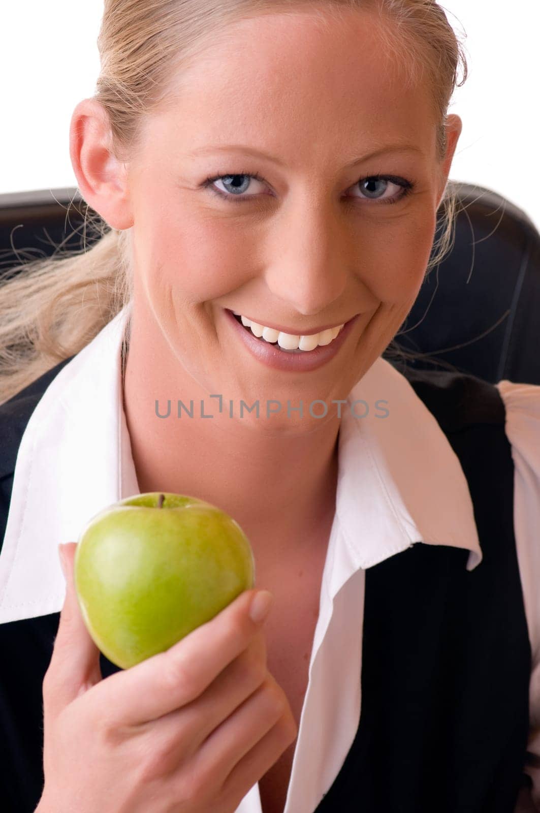 Young woman holding apple in hand