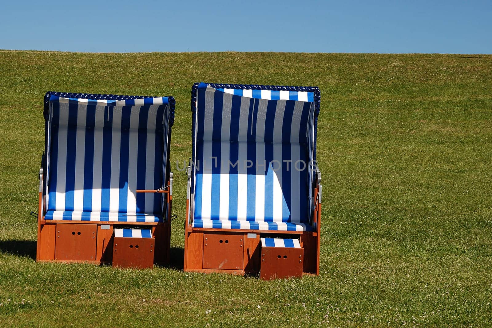 two blue beach chairs