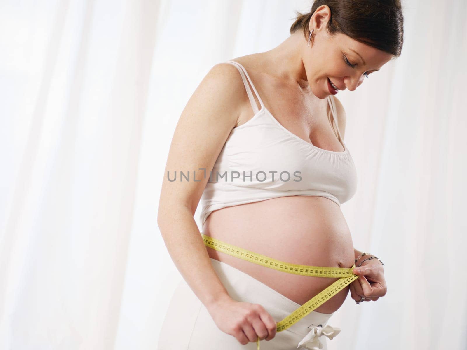 pregnant woman drinking water