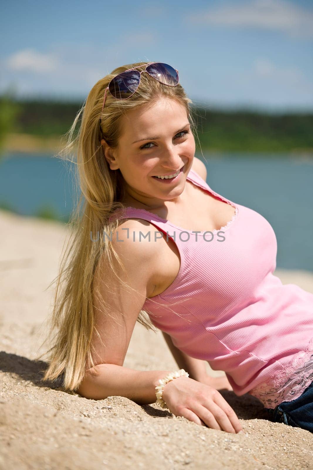 Blond woman enjoy summer sun