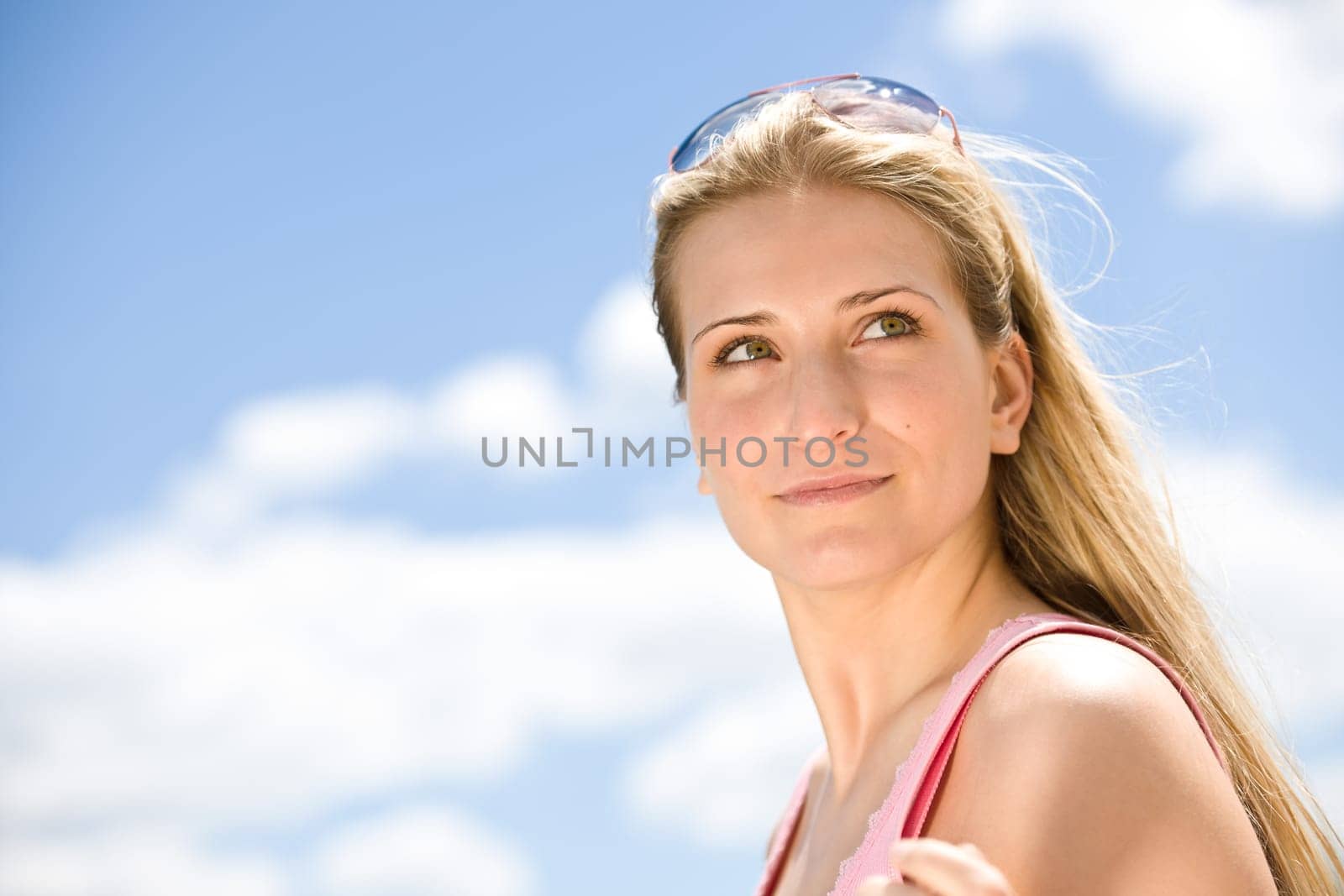 Blond woman enjoy summer sun