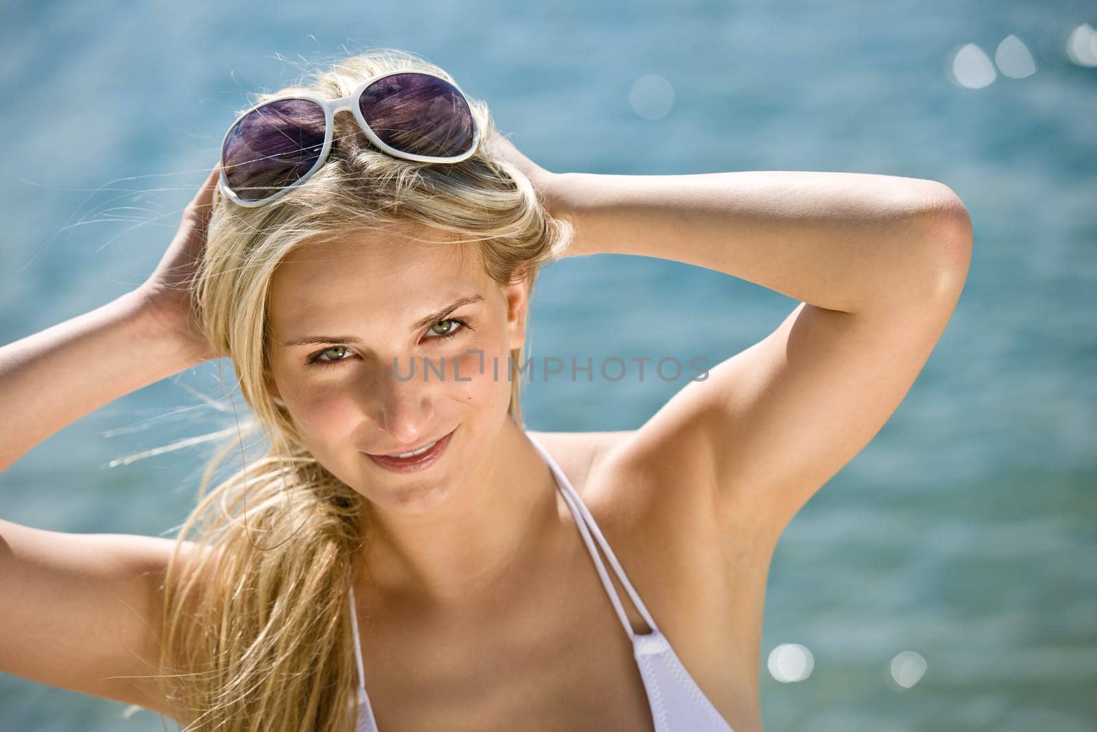 Blond woman enjoy summer sun