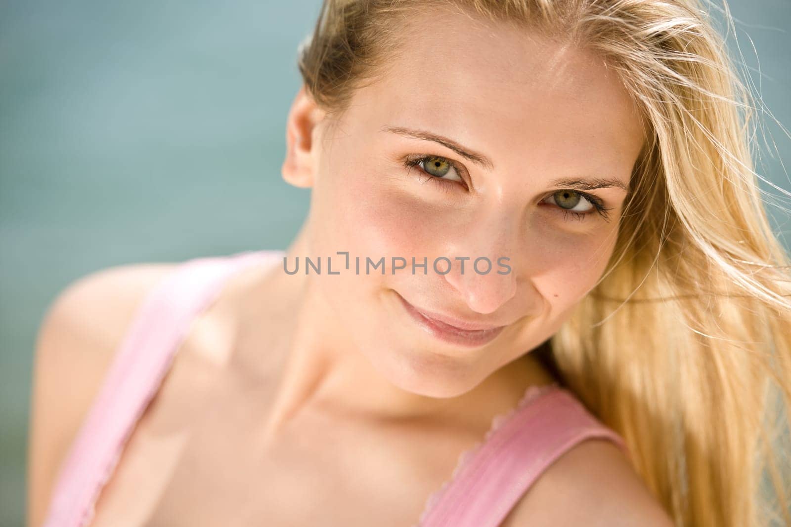 Blond woman enjoy summer sun
